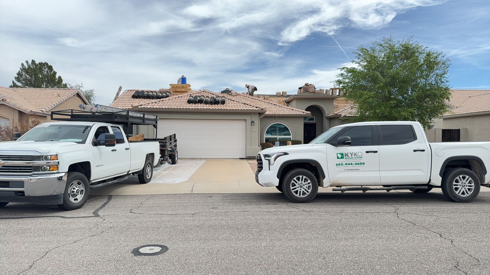 Flat concrete tile · Gilbert · November 2025 — Full underlayment failure across a 28-year-old roof. Several active leaks during monsoon.